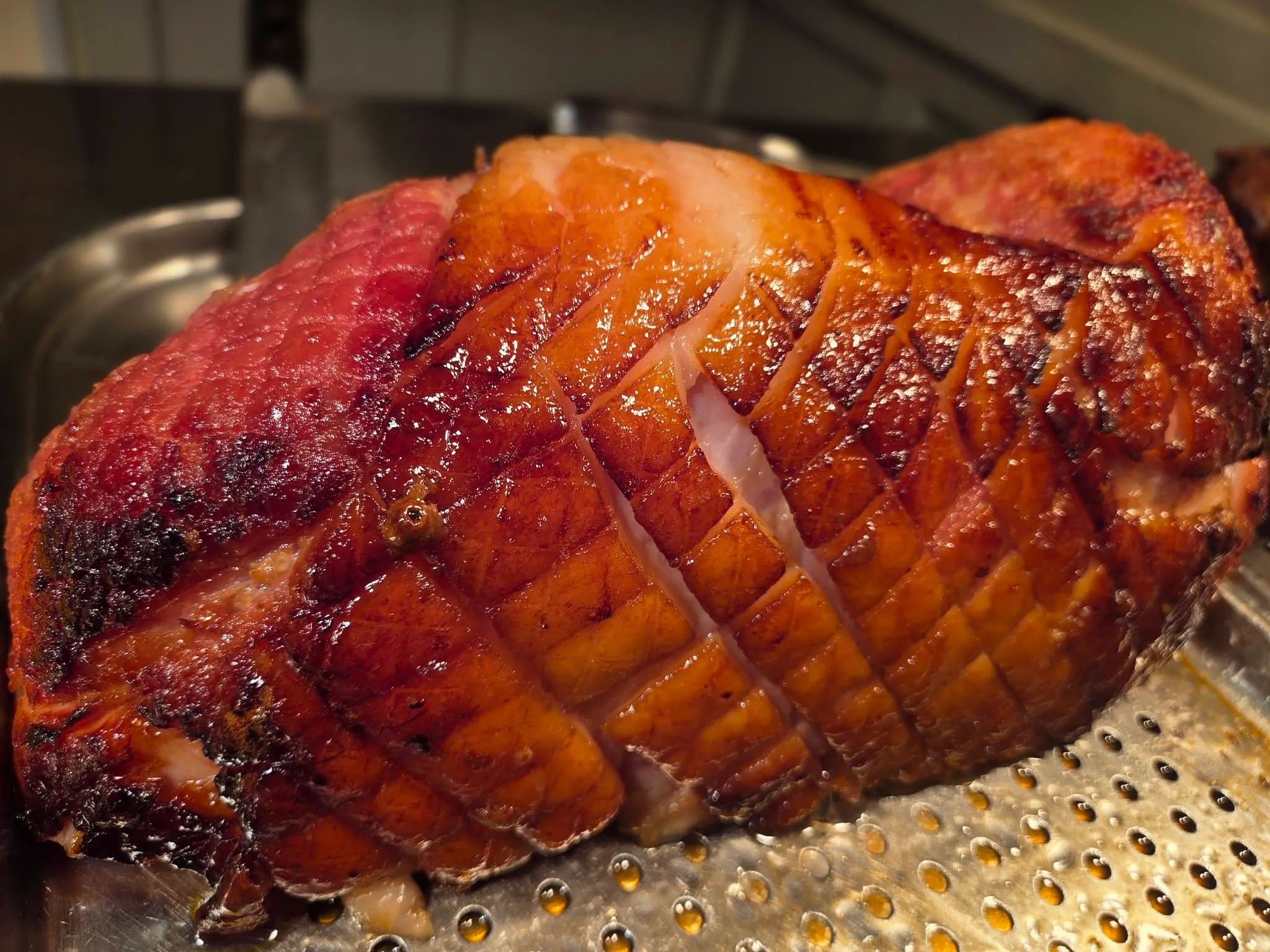 A honey-glazed gammon joint on the carvery servery at The Tavern Inn