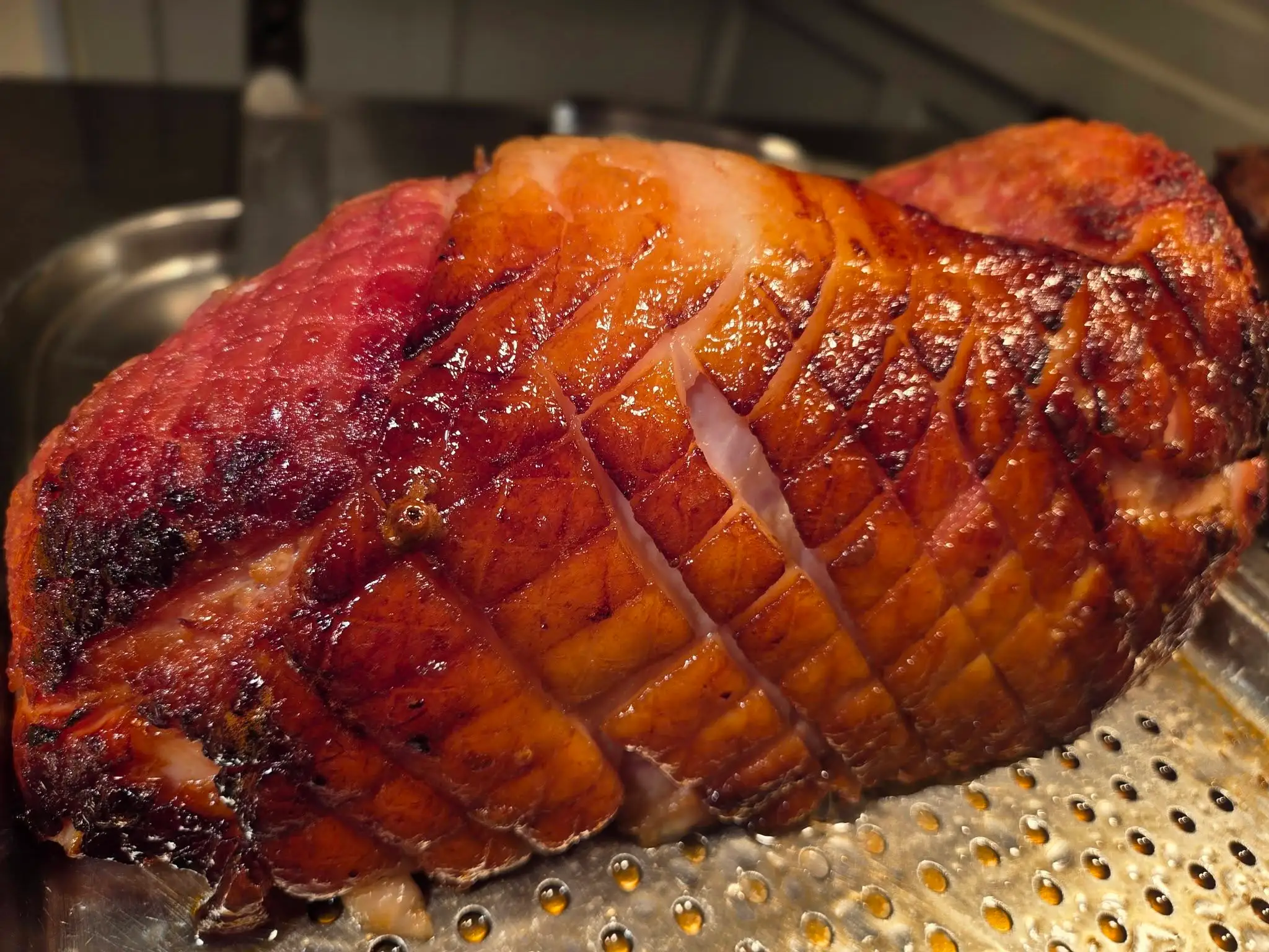 A honey-glazed gammon joint on the carvery servery at The Tavern Inn